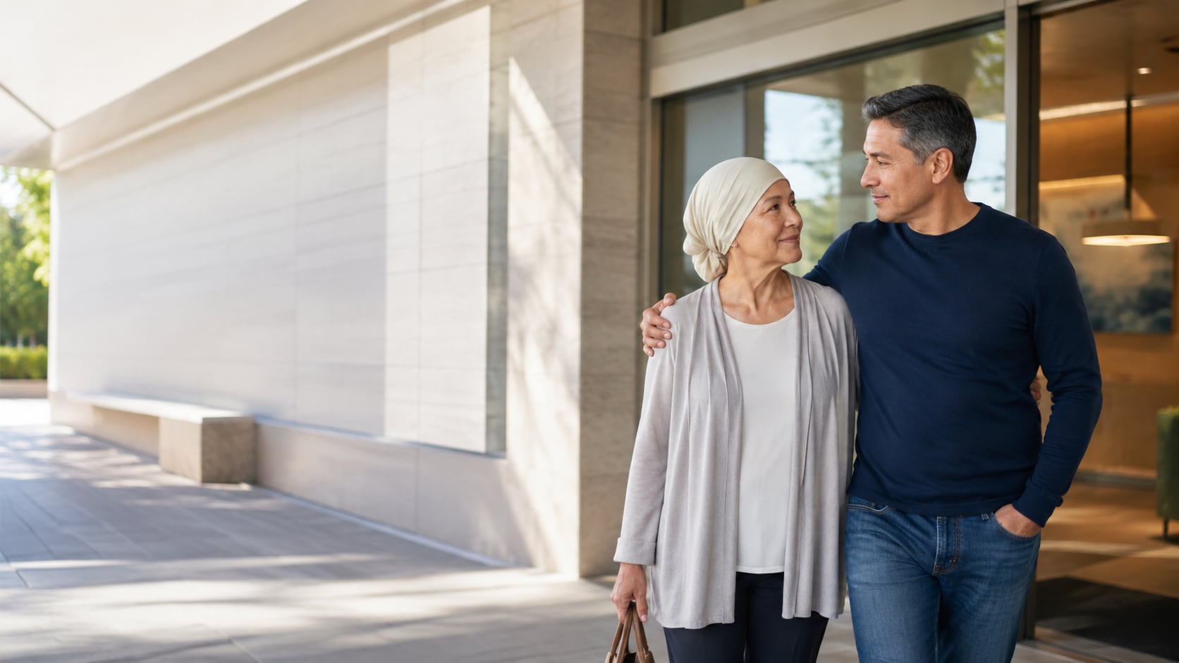 A navigator helping a patient complete financial assistance documentation